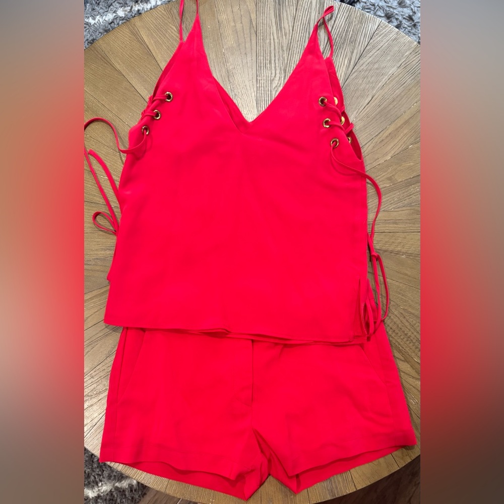 Amanda Uprichard Red Lace-Up Top and Shorts Set, vibrant and party ready.